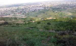 6 Plots of Titled Hillside Land in Aburi