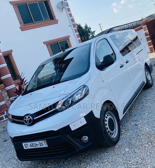 9 Seater Toyota Bus for Rent - 1