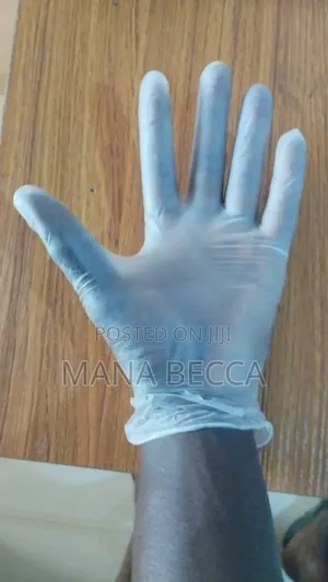 Disposable Vinyl Gloves (Medium, 100 Pieces)