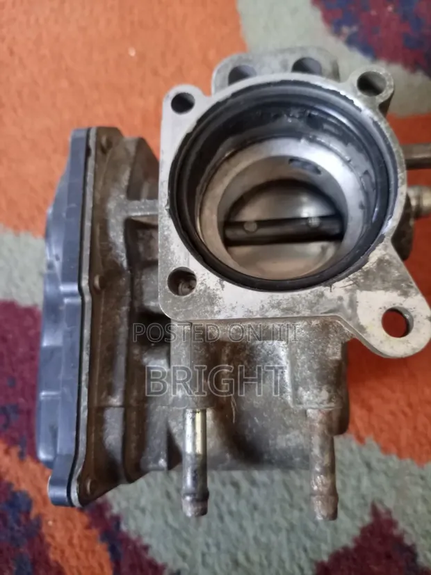 Toyota Vitz Throttle Body - 1