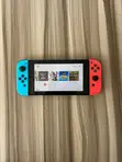 Nintendo Switch with Games and Carrying Case - 1
