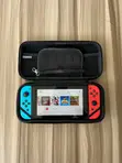 Nintendo Switch with Games and Carrying Case - 2