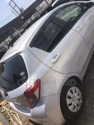 Toyota Vitz 2014 Pearl