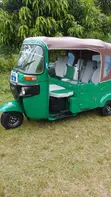 Bajaj RE 2025 Green Three-Wheeler - 1