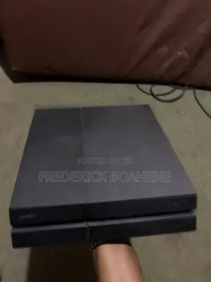 PlayStation 4 with Controller and Games