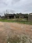Uncompleted 10-Bedroom House on Titled Land in North Legon - 1
