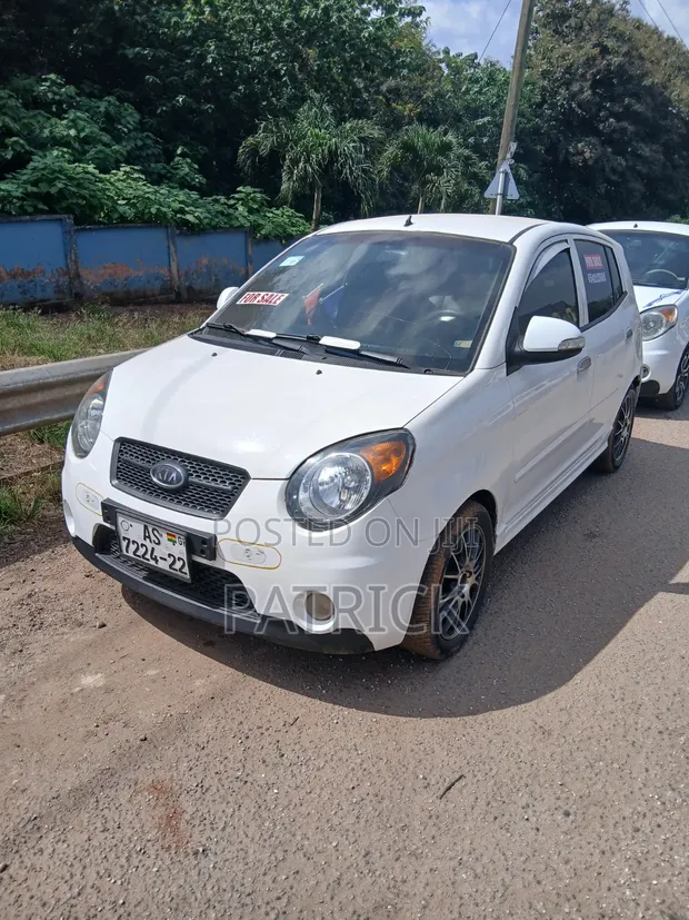 Kia Morning 2010 White - 1