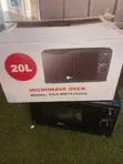 Brand New Microwave Oven - 1