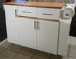 Kitchen Island Cabinet with White Finish and Wooden Countertop - 1