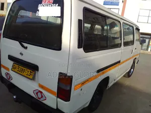 Nissan Caravan (Urvan) 2013 - White