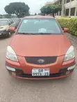 Kia Rio SX 2010 Orange Sedan - 1