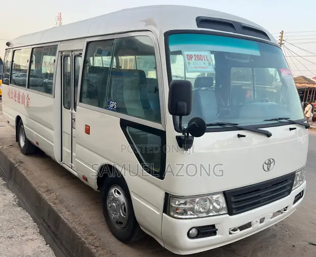 Toyota Coaster 2013 - White - 1