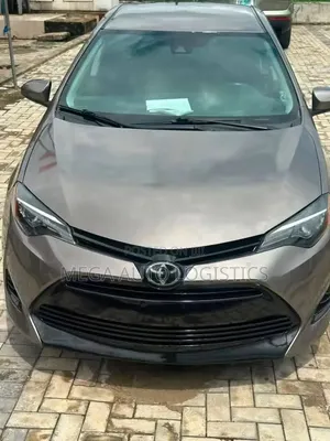 2018 Toyota Corolla LE (1.8L) Gold