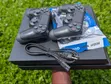 PS4 Console with 2 Controllers and 8 Games - 1