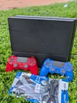 PS4 Standard 1TB Console with 2 Controllers & 13 Games - 1