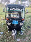 Bajaj RE 2024 Black - 1