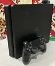 PS4 Slim Console with 4 Games - 2