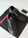 Prada America's Cup Low-Top Sneakers - All Black Patent Leather - 1